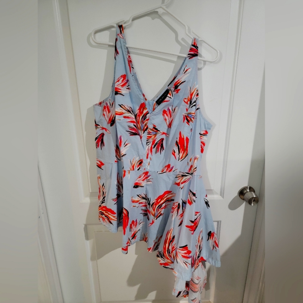 Sleeveless Peplum Style Top